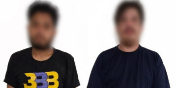 Policías Estatales aseguran a dos hombres con un arma de fuego en Culiacán