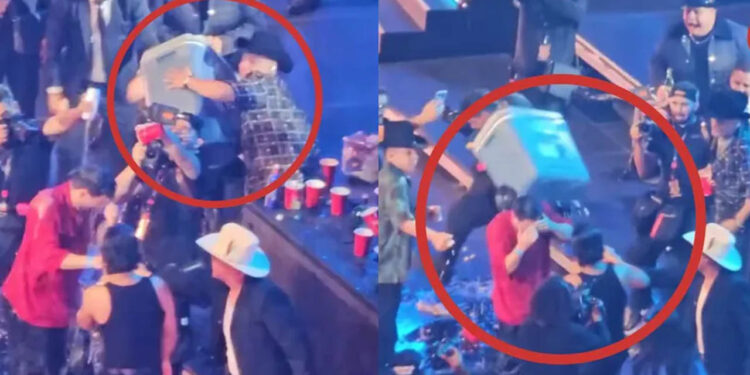 Eduin Caz, de Grupo Firme, arroja hielera a su cuñado durante concierto y lo critican