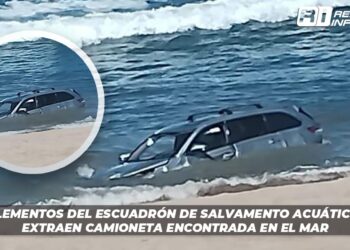 Elementos del Escuadrón de Salvamento Acuático extraen camioneta encontrada en el mar