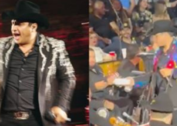Julión Álvarez sorprende a vendedora de hot-dogs en pleno palenque y le pide uno a mitad del show: “eso sí es ser humilde”