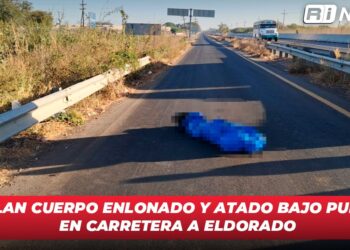 Hallan cuerpo enlonado y atado bajo puente en carretera a Eldorado