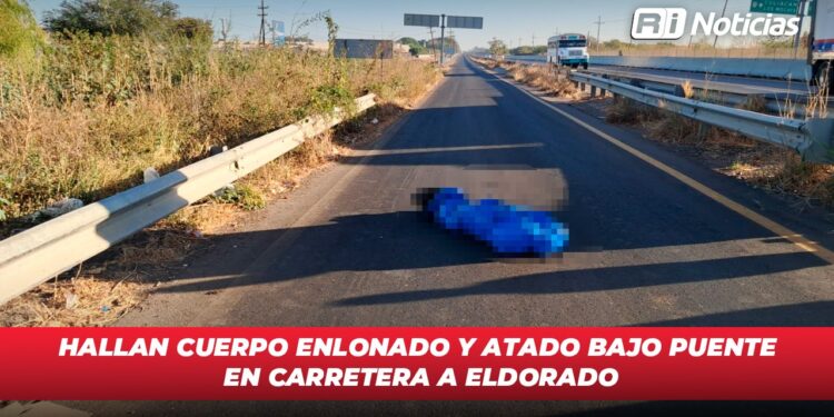 Hallan cuerpo enlonado y atado bajo puente en carretera a Eldorado