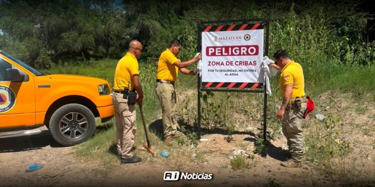 Coordinación Municipal de Protección Civil instala señalética preventiva en cauce del Rio Presidio