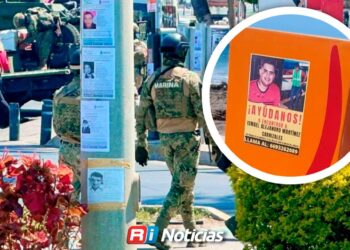 Mujeres buscadoras pegan fichas de desaparecidos en zona turística de Mazatlán